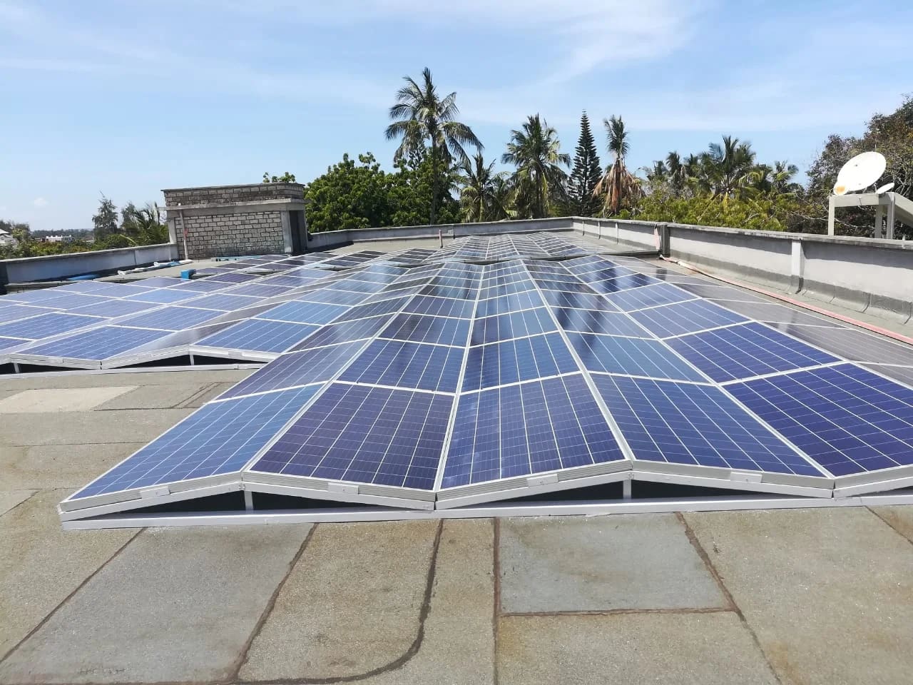 solar panels on a roof top - Top solar company in Kenya